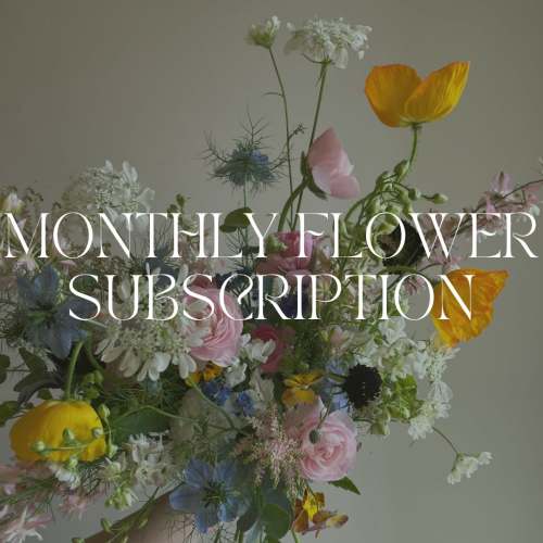 Mixed bouquet with pink, white, yellow, and blue flowers