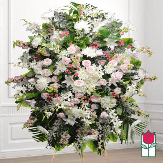 Large standing floral spray with pink roses and white lilies