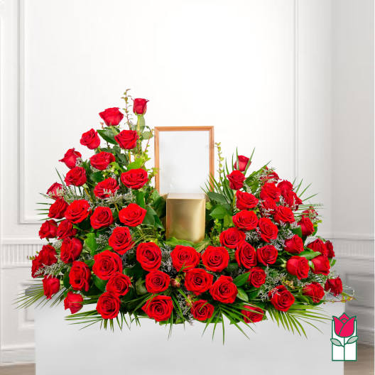 Large red rose arrangement with a gold candle and empty frame