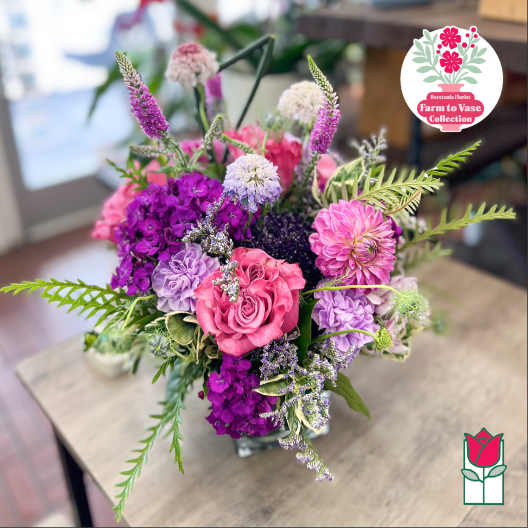 Bouquet of pink, purple, and white flowers in a vase