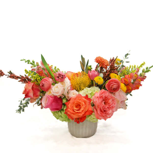 Colorful mixed bouquet in a gray vase