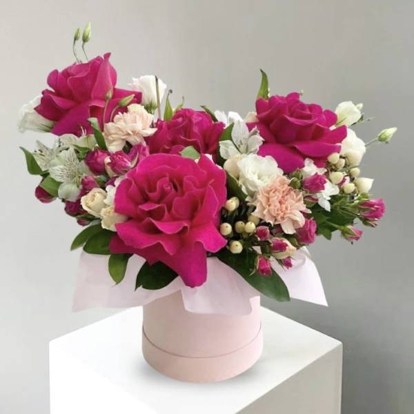 Pink and white rose bouquet in a pale pink box