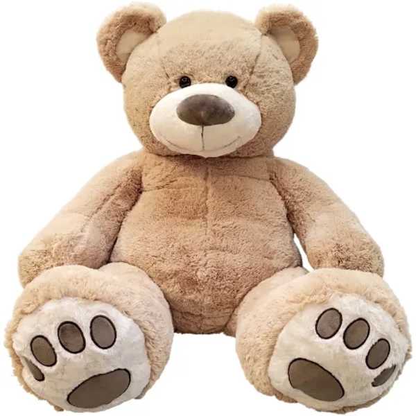 Large light brown teddy bear plush toy with oversized paws facing forward