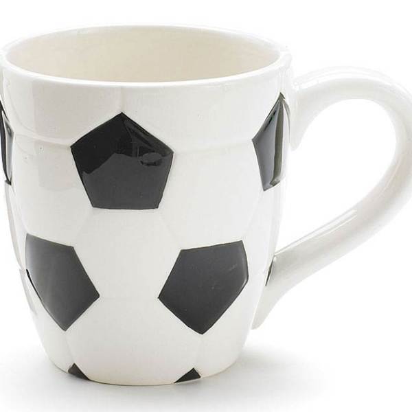 White mug with black soccer ball pattern