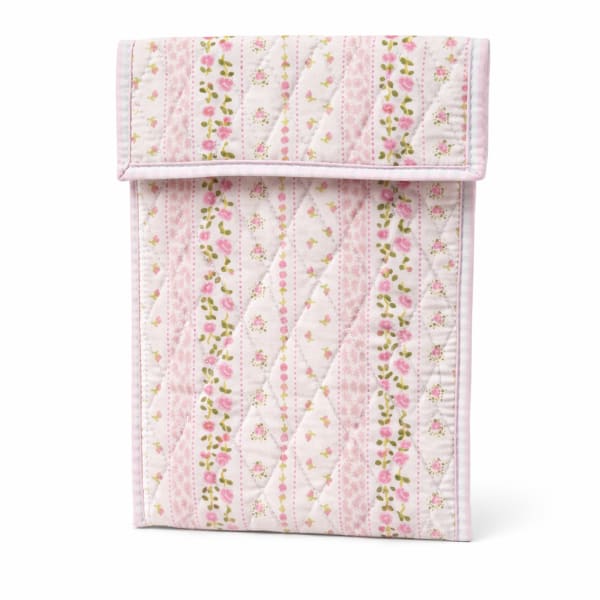 Quilted pink floral fabric pouch with a flap closure
