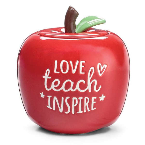 Red apple-shaped decorative container with "Love teach inspire" text