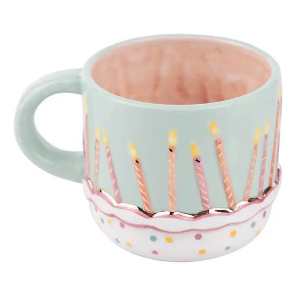 Pastel ceramic mug with candle and confetti designs
