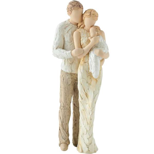 A family figurine of two adults holding a child