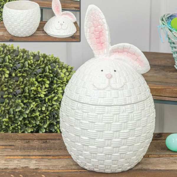 White woven bunny-shaped basket with pink ears