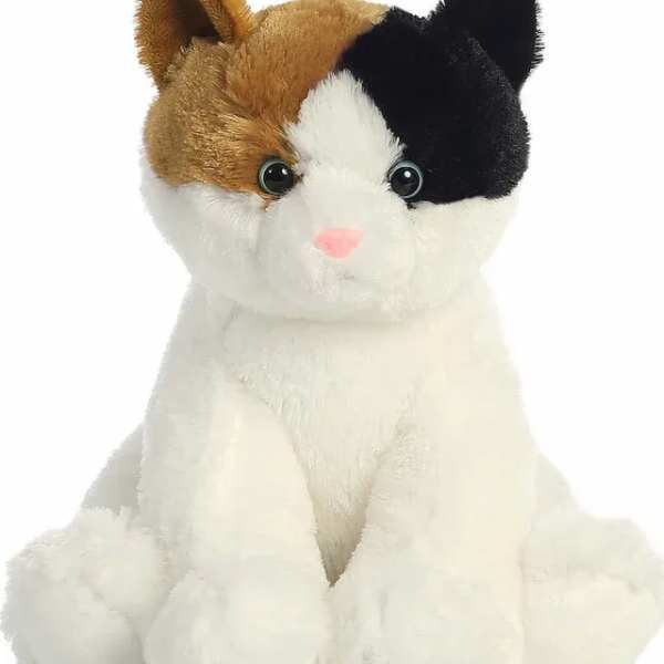 Plush calico cat stuffed animal sitting upright