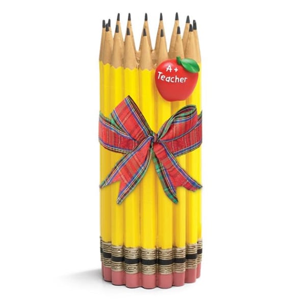 Bundle of yellow pencils tied with a plaid ribbon and apple teacher tag