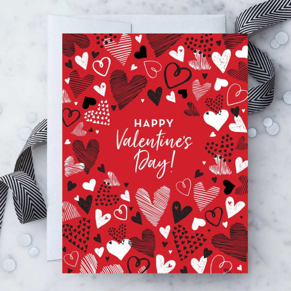 Valentine's Day card with red background and heart patterns