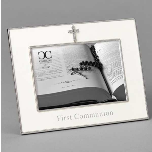 Silver photo frame with a cross and the words First Communion