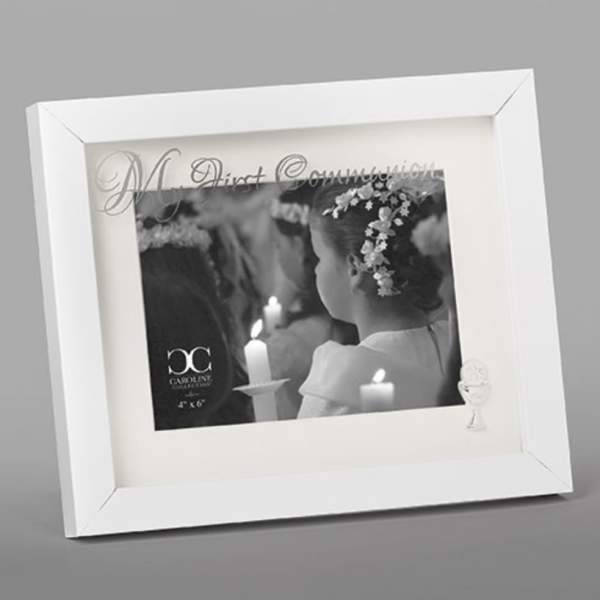 White picture frame with a black-and-white photo of a girl wearing a floral hairpiece