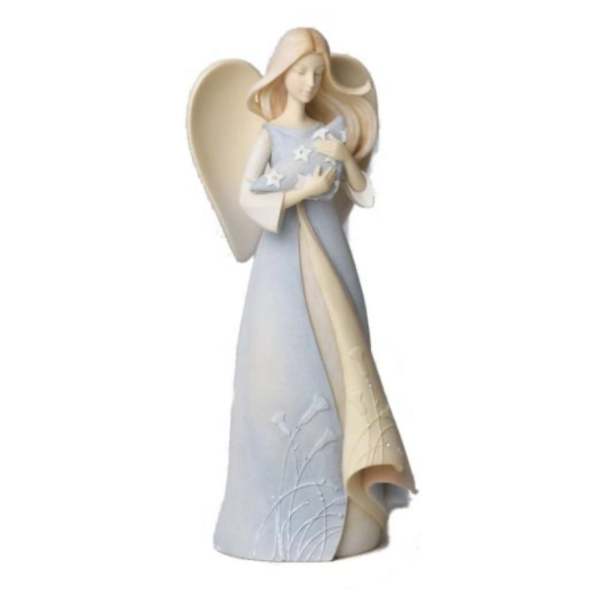 Angel figurine holding a star-patterned pillow