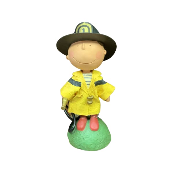 Smiling firefighter figurine in a yellow coat and black hat