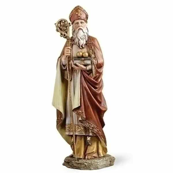 Religious statue of a bishop holding a staff and book