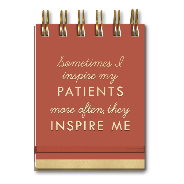 Spiral notebook with a quote on a rust-colored cover