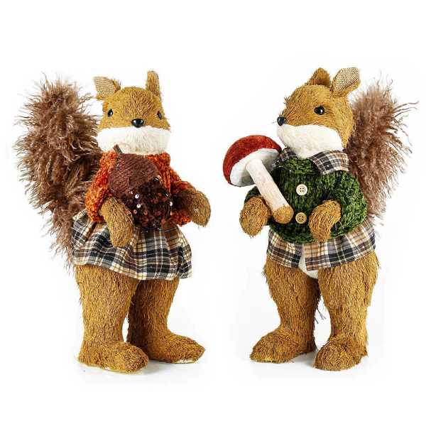 Two decorative squirrel figurines holding mushrooms