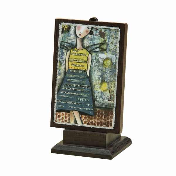 Framed decorative art on a wooden stand