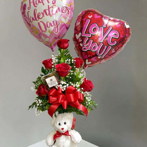 Teddy bear with roses and two heart balloons