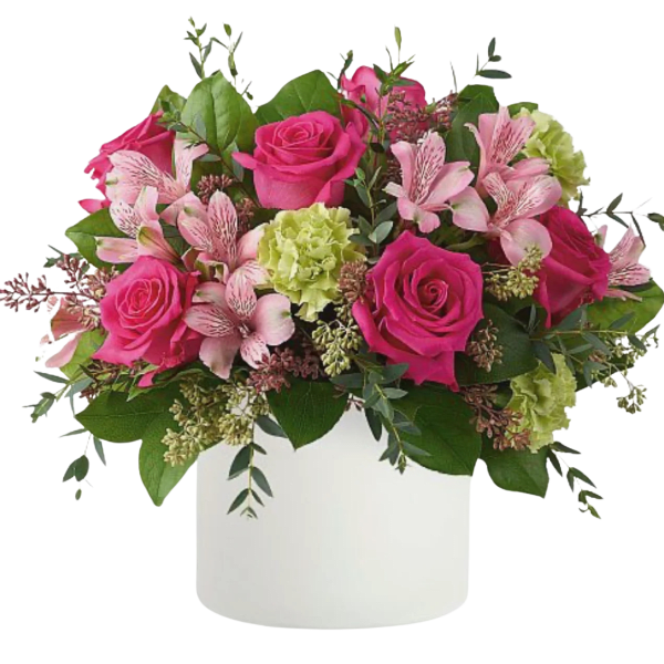 Round arrangement of hot pink roses, pink alstroemeria, and green carnations in a white cylinder vase