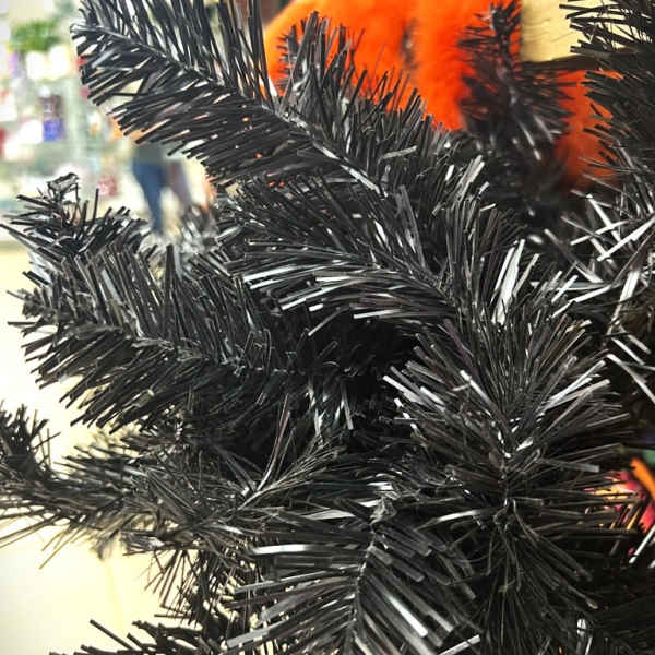 Black tinsel Halloween decoration with orange accents