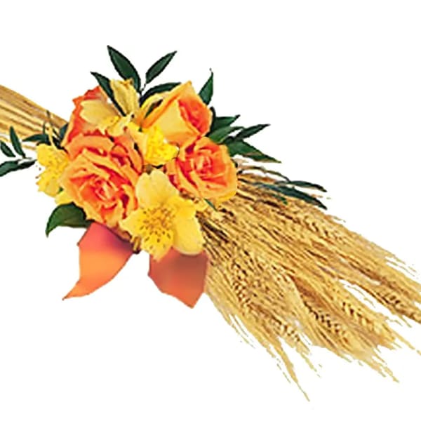 Orange and yellow flower cluster tied to a bundle of dried wheat with an orange ribbon