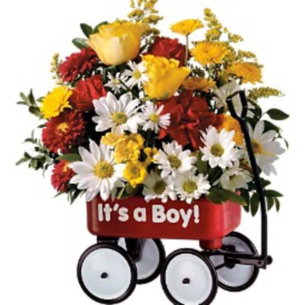 Flower arrangement in a red wagon with "It's a Boy!" text