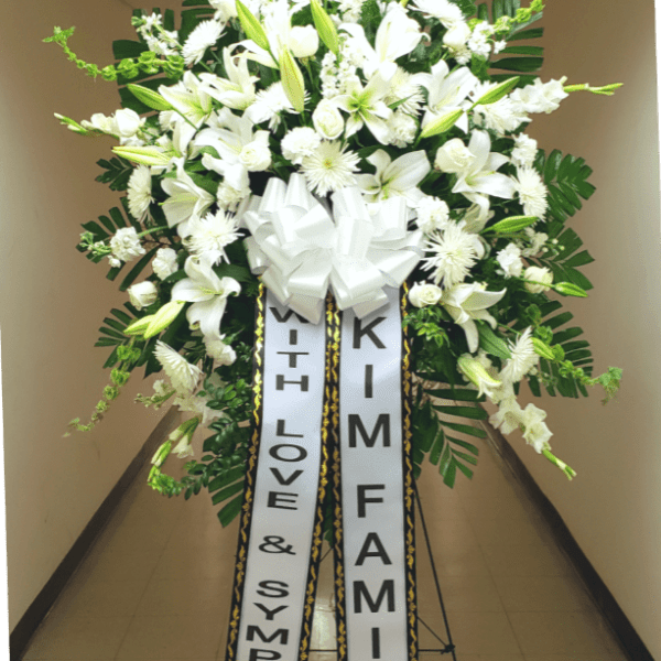 [TT-SPRAY33] GRAND SYMPATHY SPRAY IN WHITE WITH 2 PRINTED VERTICAL BANNERS BY TWIN TOWERS FLORIST, ARLINGTON VA