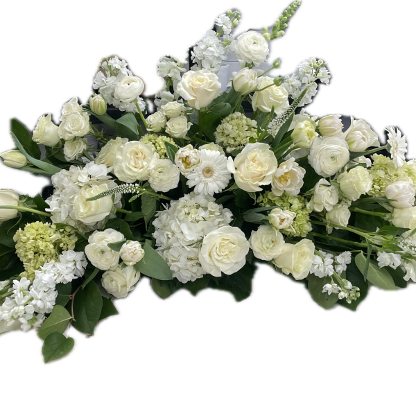 Large white floral spray with roses and mixed blooms
