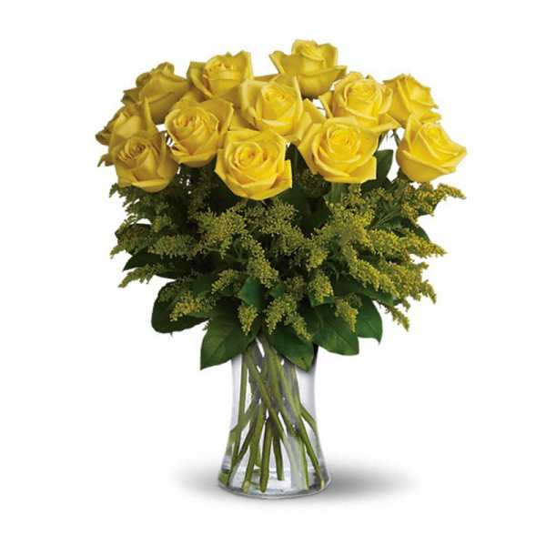 Yellow roses arranged in a clear glass vase