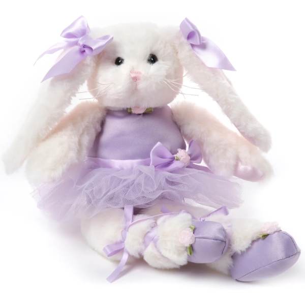 Plush white bunny doll in a lavender dress with bows