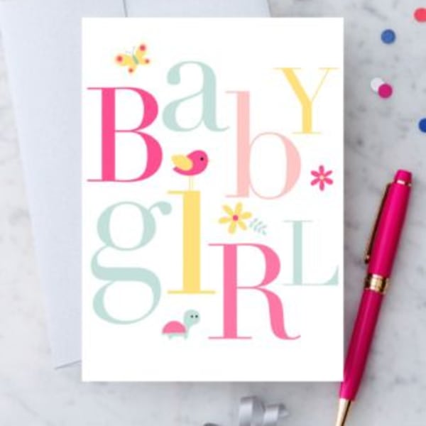 Baby girl greeting card with pastel letters and a pink pen