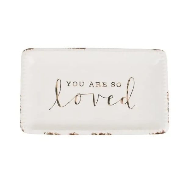 White rectangular sign reading "you are so loved"
