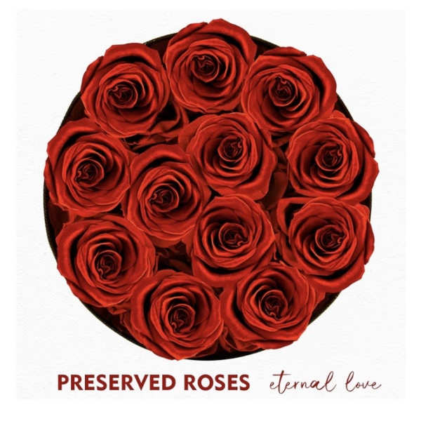 Round box of red roses arranged tightly together