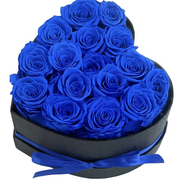 Heart-shaped box filled with bright blue roses and tied with a blue ribbon