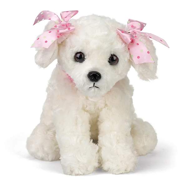 White plush puppy with pink polka-dot bows on its ears