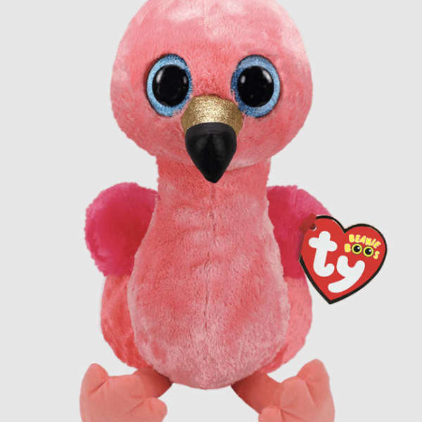 Pink plush flamingo toy with a Ty heart tag
