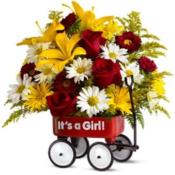 Bouquet of red roses, white daisies, and yellow lilies in a red wagon
