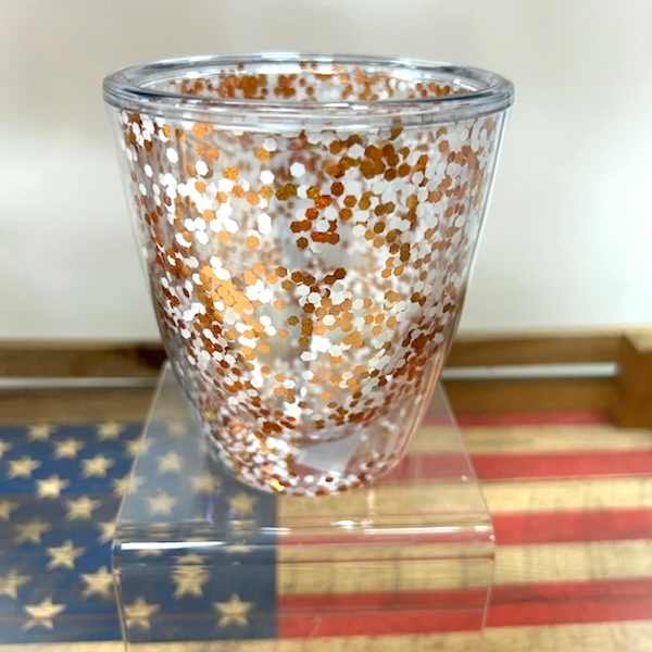 Clear glass vase with copper and white confetti pattern