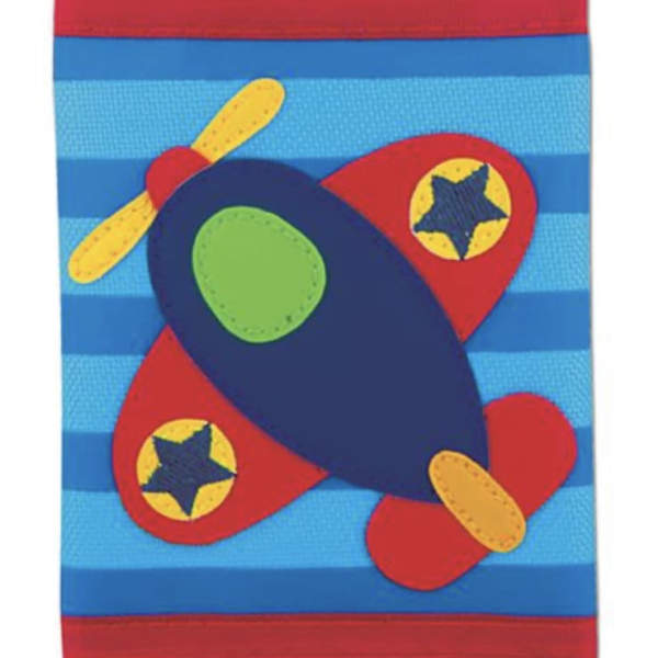 Colorful fabric wall hanging with abstract airplane shapes