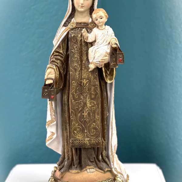 Religious statue of a crowned woman holding a child