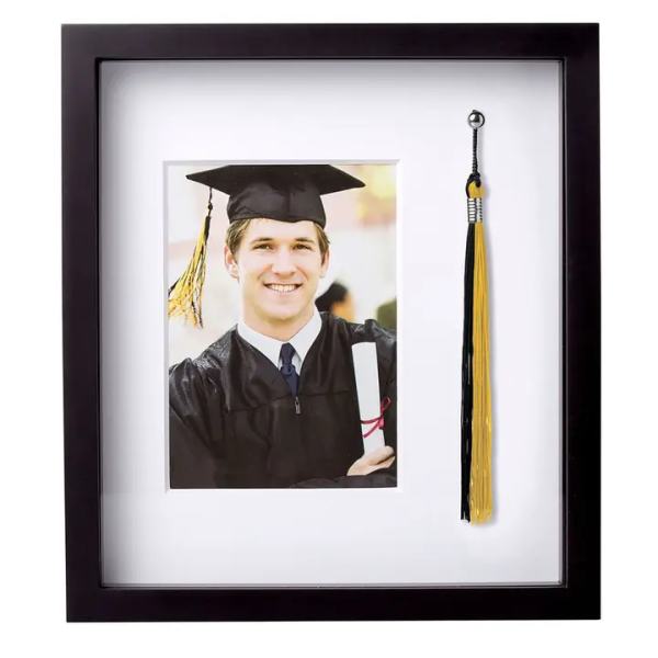 Framed graduation photo with a black-and-gold tassel