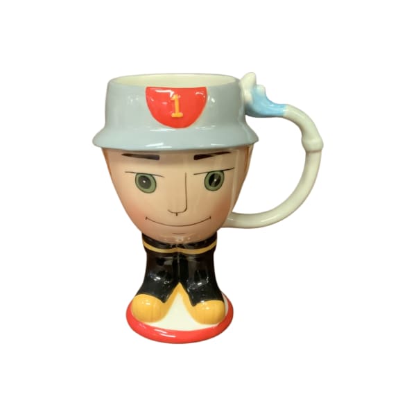 Novelty ceramic mug shaped like a cartoon character in a helmet