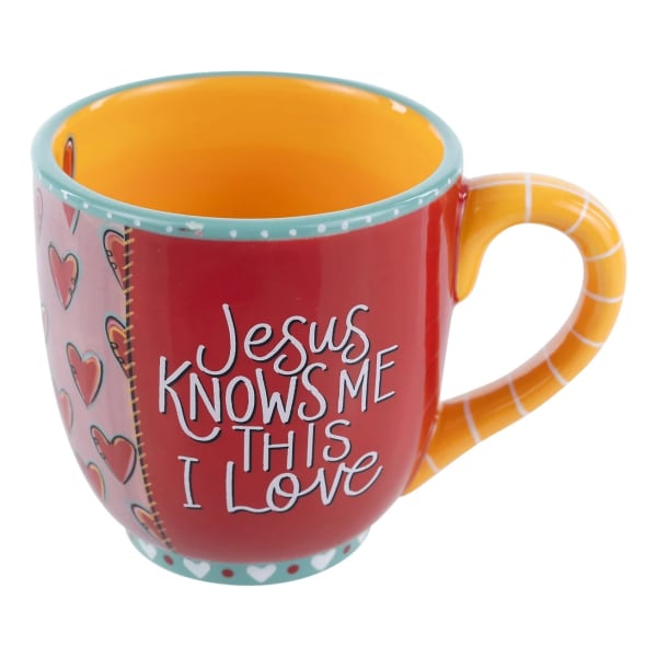 Colorful mug with hearts and the words "Jesus knows me this I love"