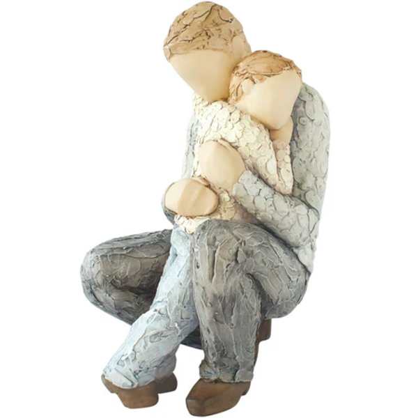 Two seated figurines embracing, painted in muted beige and gray tones