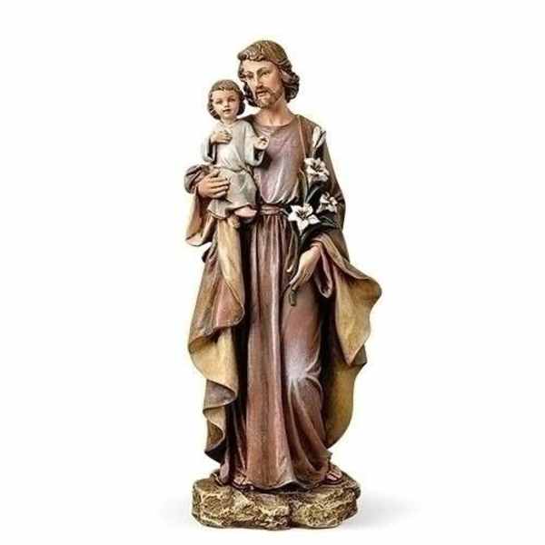 Religious statue of a man holding a child and white lilies