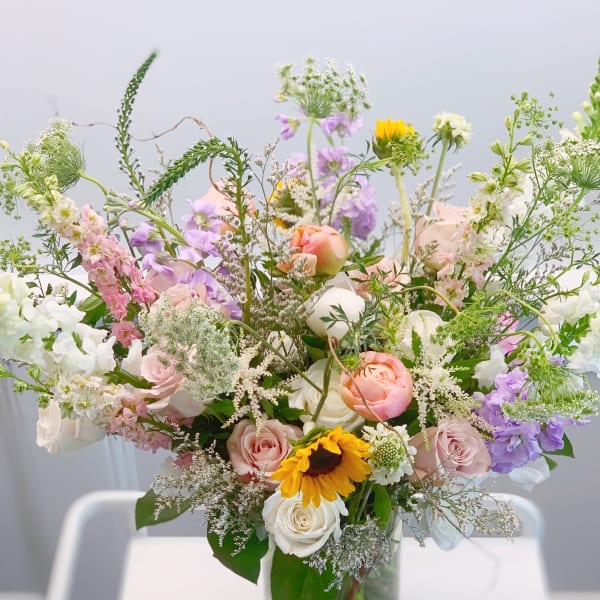 Pastel mixed bouquet with roses, ranunculus, and snapdragons