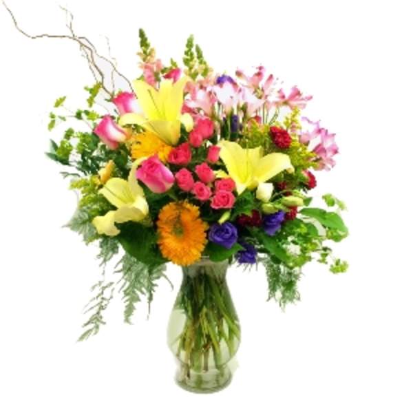 Colorful mixed bouquet in a clear glass vase
